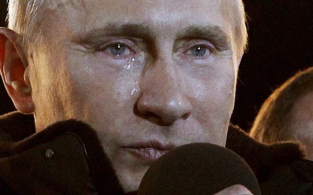 Russian Prime Minister Vladimir Putin, who claimed victory in Russia's presidential election, tears up as he reacts at a massive rally of his supporters at Manezh square outside Kremlin, in Moscow, Sunday. (photo credit: AP/Ivan Sekretarev) Russian Prime Minister Vladimir Putin, who claimed victory in Russia's presidential election, tears up as he reacts at a massive rally of his supporters at Manezh square outside Kremlin, in Moscow, Sunday. (photo credit: AP/Ivan Sekretarev)