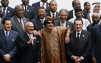 Libyan leader Muammar Gaddafi, center, flanked on his right by Egyptian President Hosni Mubarak, and on his left by Yemeni President Ali Abdullah Saleh, with Tunisian President Zine El Abidine Ben Ali on the far left, posing during the second Afro-Arab summit in Sirte, Libya, in 2010 (photo credit: AP/Amr Nabil)