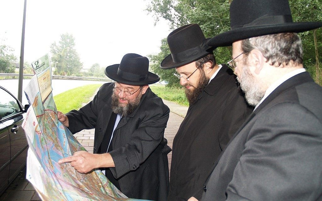 Amsterdam's former Chief Rabbi Aryeh Ralbag, left, with members of Amsterdam's rabbinate in this 2012 file photo. (David Serphos/JTA)
