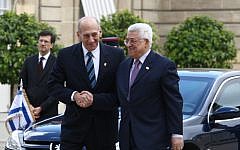 Former prime minister Ehud Olmert meets with Palestinian Authority President Mahmoud Abbas in Paris in 2008 (photo credit: Thaer Ganaim/Flash90)
