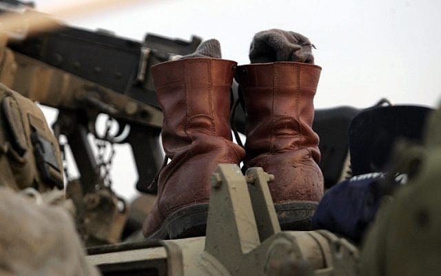 IDF boots on a tank during Operation Cast Lead (photo credit: Nati Shohat/Flash 90)