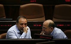 Foreign Minister Avigdor Liberman speaks with vice Prime Minister Moshe Ya'alon during a session in the Knesset, June 2009  (photo credit: Miriam Alster/Flash90)