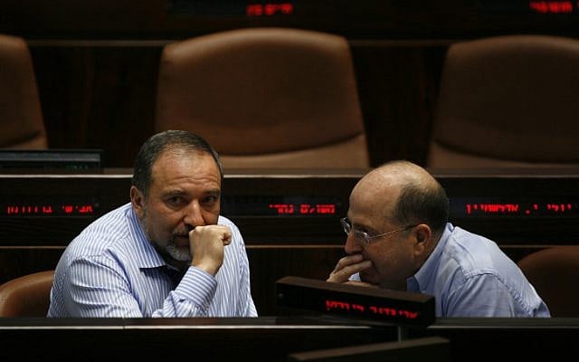 Foreign Minister Avigdor Liberman speaks with vice Prime Minister Moshe Ya'alon during a session in the Knesset, June 2009 (photo credit: Miriam Alster/Flash90) Foreign Minister Avigdor Liberman speaks with vice Prime Minister Moshe Ya'alon during a session in the Knesset, June 2009 (photo credit: Miriam Alster/Flash90)