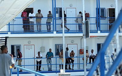 Sudanese refugees in the courtyard of Ketziot Prison detention camp in 2009 (photo credit: Moshe Shai/Flash90)