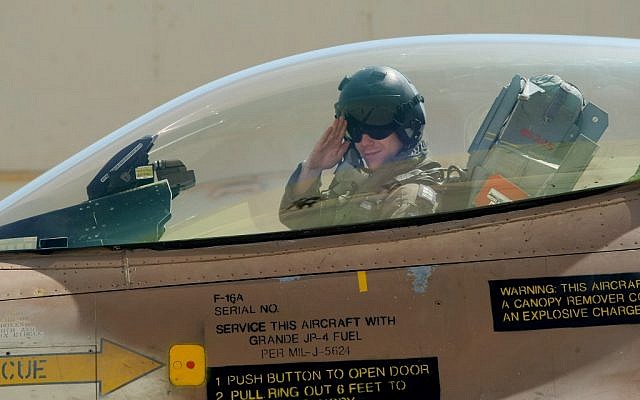 An Israeli Air Force pilot salutes from the cockpit of an F-16 (photo credit: Moshe Shai/Flash90)