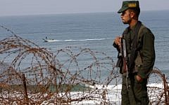 A Hamas security official at the Egypt-Gaza border near Rafah (photo credit: Abed Rahim Khatib/Flash90)