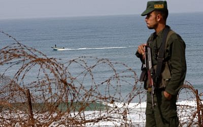 A Hamas security official at the Egypt-Gaza border near Rafah (photo credit: Abed Rahim Khatib/Flash90)