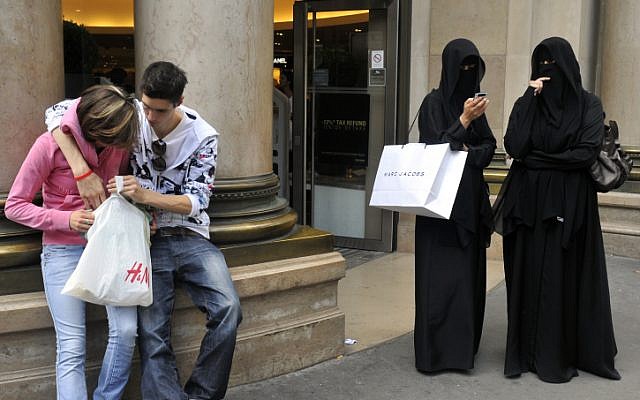 Illustrative: Muslim women shopping alongside non-Muslim Parisians. (Serge Attal/Flash 90) Illustrative: Muslim women shopping alongside non-Muslim Parisians. (Serge Attal/Flash 90)