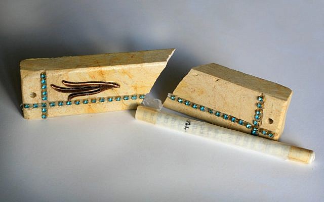 Illustrative photo of a broken mezuza (Chen Leopold/Flash90)