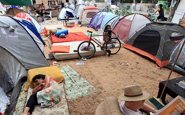 Fed up with the high cost of housing in Israel, thousands of Israelis set up tents on Rothschild Boulevard in Tel Aviv and elsewhere around the country last summer. (photo credit: Liron Almog/Flash90)
