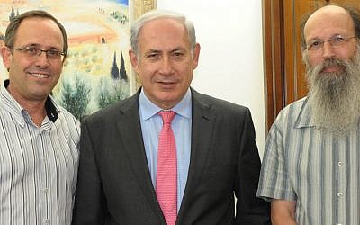 Prime Minister Benjamin Netanyahu (center) with Bar-Ilan University CEO Chaim Glick (left) and Professor Michael Weingarten, vice dean of the Faculty of Medicine, at the opening of Bar-Ilan University's Medical School last September (photo credit: Moshe Milner/GPO/Flash90)