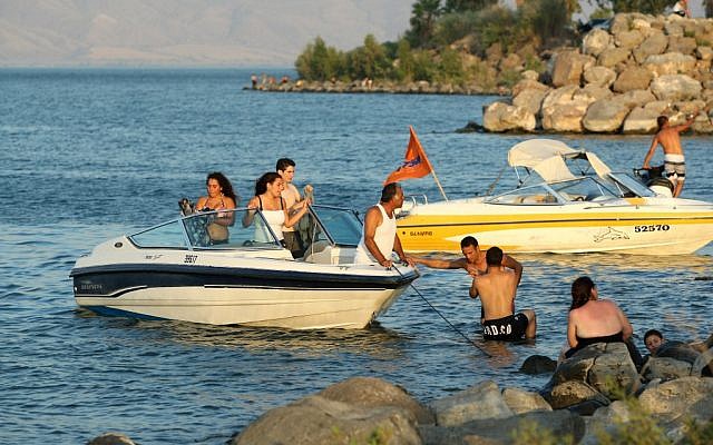 Israelis enjoy the Sea of Galilee. (photo credit: Moshe Shai/Flash90)
