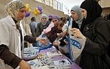 Arab women attend the opening of an infant care clinic in Jerusalem (photo credit:  Miriam Alster/FLASH90)