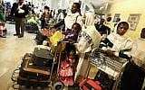 Newly arrived Ethiopian immigrants at Ben Gurion International Airport (photo credit: Kobi Gideon/Flash90)