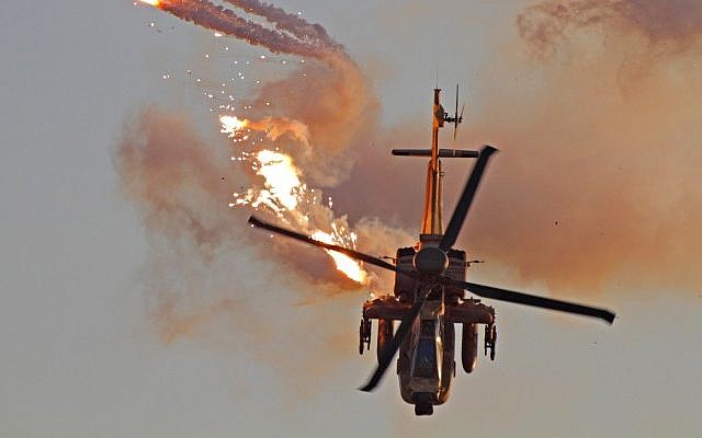 An Israeli Apache helicopter fires missiles during a training exercise (Illustrative photo:Ofer Zidon/Flash90)