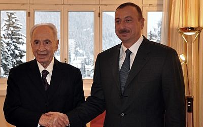 President Shimon Peres meets with Azerbaijan's President Ilham Aliyev at the World Economic Forum in Davos, Switzerland, in January, 2012. (photo credit: Flash90)