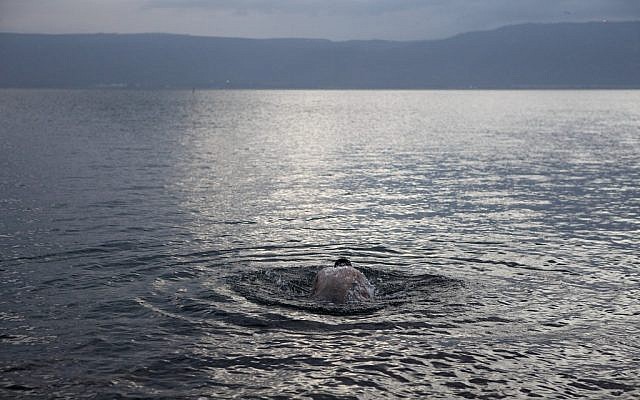A man takes a swim in the Sea of Galilee (photo credit: Yaakov Nahumi/Flash90) A man takes a swim in the Sea of Galilee (photo credit: Yaakov Nahumi/Flash90)