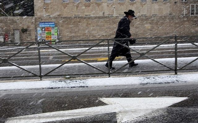 Snow causes dangerous road conditions in Jerusalem on Friday (photo credit: Nati Shohat/Flash90)