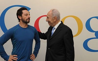 President Shimon Peres with Sergei Brin of Google at Google headquarters in Mountain View, California. Peres urged Brin to increase Google's research and development activity in Israel (Photo credit: Moshe Milner/ GPO/FLASH90)