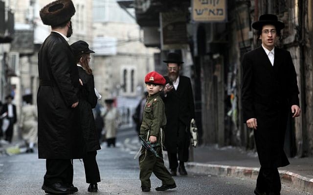Israeli public opinion wants this ultra-Orthodox child dressed up for Purim to wear a similar uniform when he turns 18. (photo credit: Kobi Gideon/Flash90)
