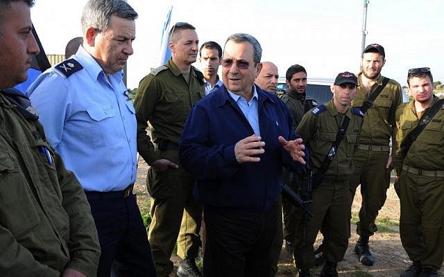 Defence Minister Ehud Barak visits the Iron Dome anti-rocket defence system in Southern Israel on Saturday, March 10. The missile defense system intercepted more than two dozen rockets launched from Gaza at Israel's southern cities in the previous 24 hours. (photo credit: Ministry of Defence/Flash90) Defence Minister Ehud Barak visits the Iron Dome anti-rocket defence system in Southern Israel on Saturday, March 10. The missile defense system intercepted more than two dozen rockets launched from Gaza at Israel's southern cities in the previous 24 hours. (photo credit: Ministry of Defence/Flash90)