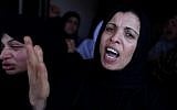 Relatives of Islamic Jihad militant Fayeq Said mourn his death in Gaza (photo credit: Wissam Nassar/Flash90)