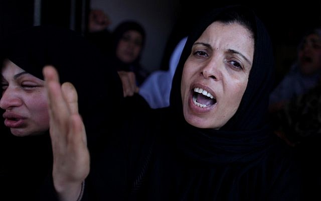 Relatives of Islamic Jihad militant Fayeq Said mourn his death in Gaza (photo credit: Wissam Nassar/Flash90)