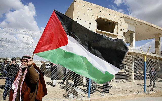 A Palestinian protests Egypt near Rafah on March 17 (photo credit: Flash 90/ Abd Rahim Khatib)
