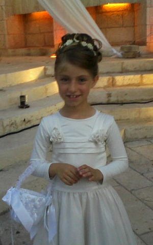 Reproduction photo of 8-year-old Miriam Monsonego, daughter of school headmaster Rabbi Yaacov Monsonego, who was killed in a shooting attack at the Ozar Hatorah School in Toulouse, France, early Monday morning. (photo credit: Flash90)