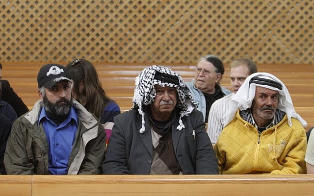.Abed al-Kader Muhammad Moatan (center) and two other Palestinian petitioners to the High Court of Justice on Thursday (Photo credit: Uri Lenz/ Flash 90)