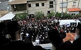 Hundreds escort five members of the Shire family, victims of a house fire, to their final resting places in Rehovot on Tuesday (photo credit: Yehoshua Yosef/Flash90)