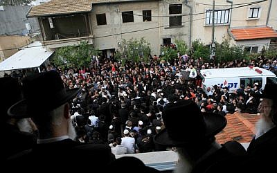 Hundreds escort five members of the Shire family, victims of a house fire, to their final resting places in Rehovot on Tuesday (photo credit: Yehoshua Yosef/Flash90)