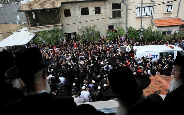 Hundreds escort five members of the Shire family, victims of a house fire, to their final resting places in Rehovot on Tuesday (photo credit: Yehoshua Yosef/Flash90)