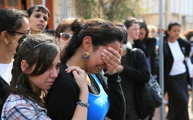Mourners at the funeral for the Shire family (photo credit: Yehoshua Yosef/Flash90)