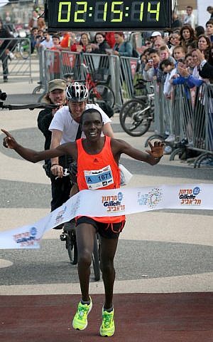 Kenyan Sammy Tu won the race, with a local record time of 2:15:14 (photo credit: Gideon Markowicz/Flash90) Kenyan Sammy Tu won the race, with a local record time of 2:15:14 (photo credit: Gideon Markowicz/Flash90)