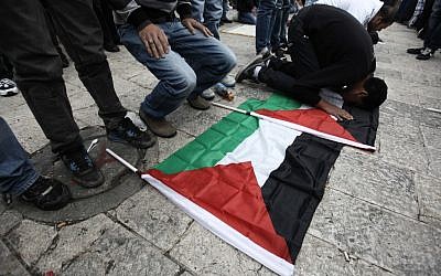 Palestinians pray in Jerusalem on Land Day, March 30 (photo credit: Kobi Gideon / Flash90)