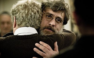 Lior Ashkenazi hugs Shlomo Bar Aba in a scene from 'Footnote.' (Photo credit: Sony Classics)
