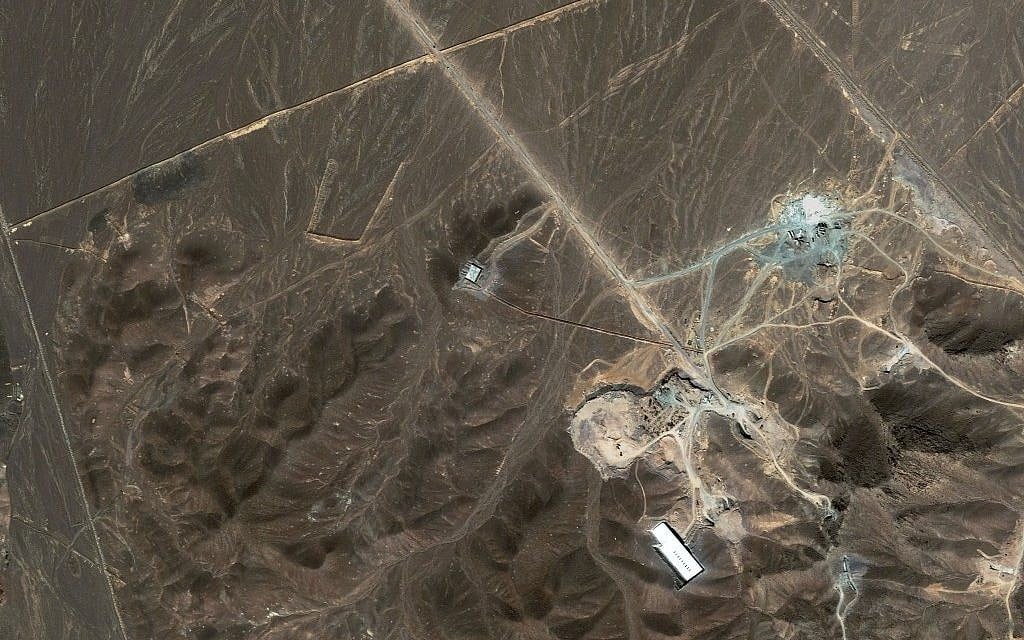 A file satellite image taken Sunday Sept. 27, 2009, provided by DigitalGlobe, shows a suspected nuclear enrichment facility under construction inside a mountain located north of Qom. (photo credit: AP)