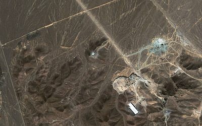 A file satellite image taken Sunday Sept. 27, 2009, provided by DigitalGlobe, shows a suspected nuclear enrichment facility under construction inside a mountain located north of Qom. (photo credit: AP)