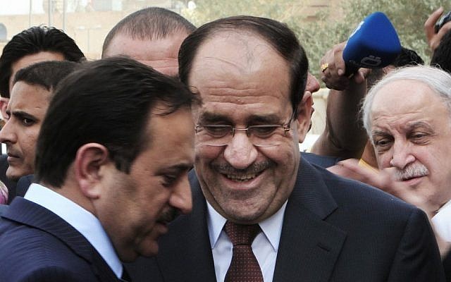 Iraqi Prime Minister Nuri al-Maliki, center (photo credit: AP/Ali Haider) Iraqi Prime Minister Nuri al-Maliki, center (photo credit: AP/Ali Haider)
