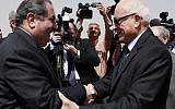 Iraqi Foreign Minister Hoshyar Zebari (left) shakes hands with Arab League Secretary General Nabil Al-Araby (photo credit: AP/Hadi Mizban)