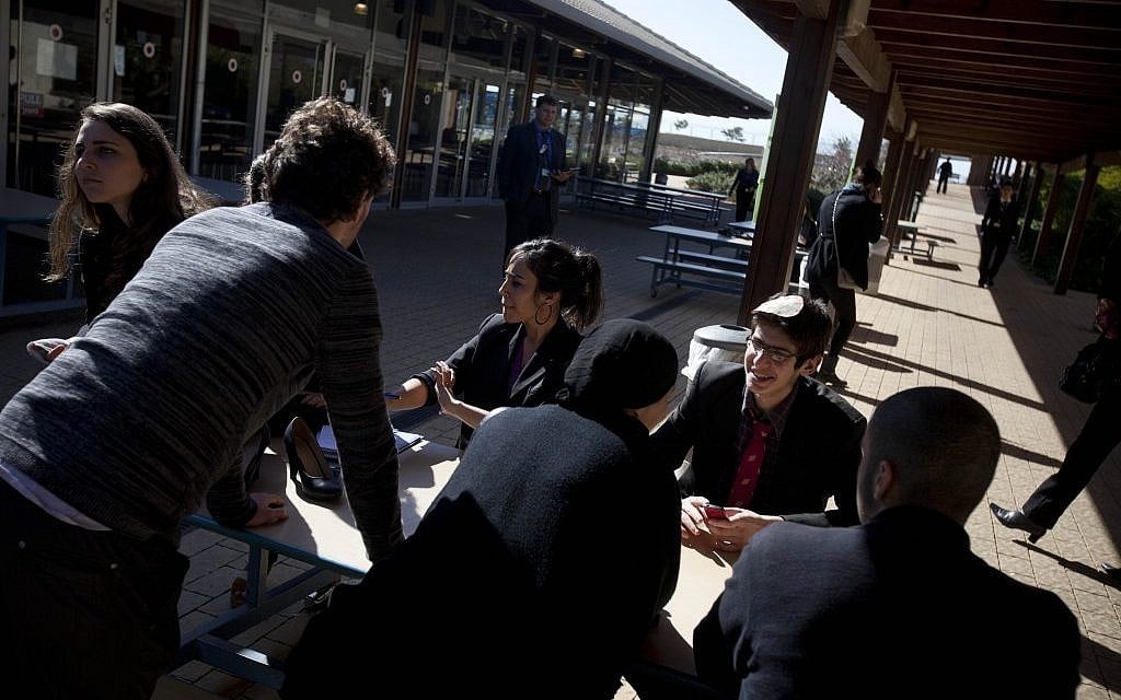 Students sit together during model United Nations 'peace negotiations' at the American International school in Even Yehuda. (photo credit: AP/Oded Balilty) Students sit together during model United Nations 'peace negotiations' at the American International school in Even Yehuda. (photo credit: AP/Oded Balilty)