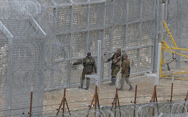 Israeli soldiers guarding the border with Syria near Majdal Shams on the Golan Heights. (photo credit: AP/Hamad Almakt) Israeli soldiers guarding the border with Syria near Majdal Shams on the Golan Heights. (photo credit: AP/Hamad Almakt)