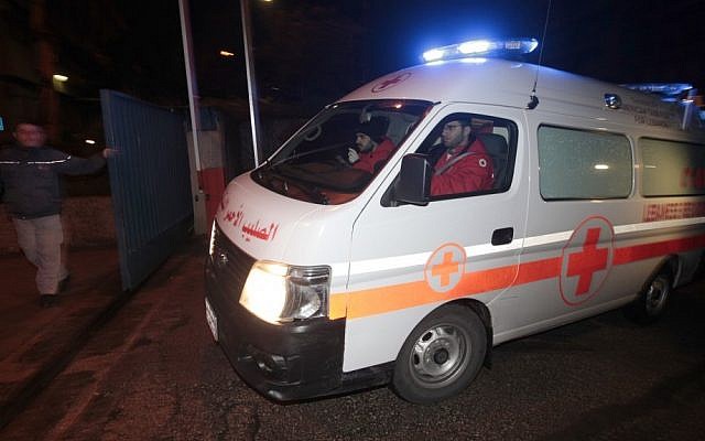 A Lebanese Red Cross ambulance follows Lebanese police vehicles carrying two injured French journalists who were trapped at Baba Amr neighborhood in Homs province. (photo credit: AP) A Lebanese Red Cross ambulance follows Lebanese police vehicles carrying two injured French journalists who were trapped at Baba Amr neighborhood in Homs province. (photo credit: AP)