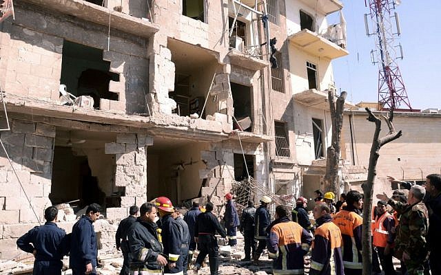 The scene of Sunday's explosion in Aleppo (photo credit: AP/SANA)