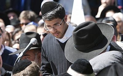 Avishai Monsonego, brother of Miriam Monsonego, at Miriam's funeral in Jerusalem Wednesday. Miriam was killed in a shooting attack at her school Monday. (photo credit: Yonatan Sindel/Flash90)