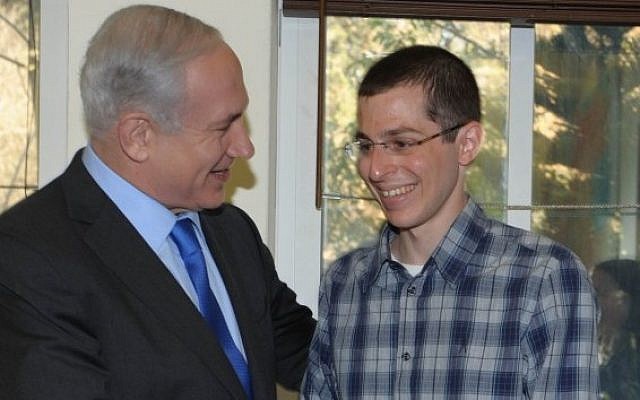 Prime Minister Benjamin Netanyahu meets Gilad Shalit in Tel Avivon March 29, 2012. (photo credit: Moshe Milner/ GPO / Flash90)