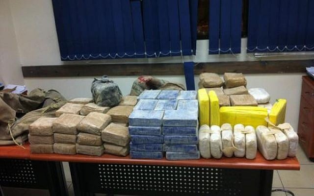 Illustrative photo of cocaine and heroin confiscated by Israeli police in 2012. (Israel Police)