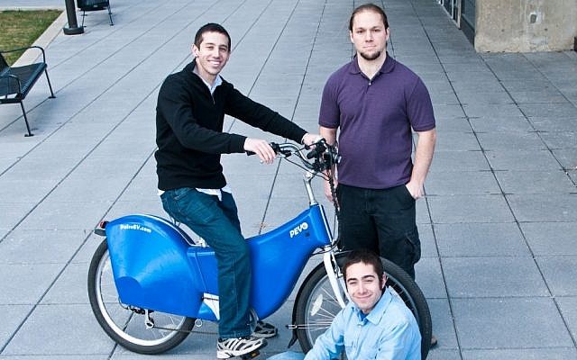The Pulse team: Micah Toll (seated on PEV0); Thorin Tobiassen (standing right); and Max Pless (seated on the ground) (Photo credit: Courtesy) The Pulse team: Micah Toll (seated on PEV0); Thorin Tobiassen (standing right); and Max Pless (seated on the ground) (Photo credit: Courtesy)