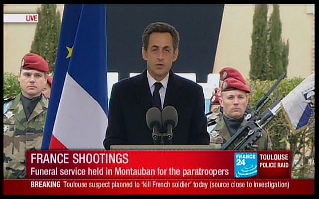 French President Nicolas Sarkozy speaks at the memorial service for slain soldiers on Wednesday. (photo credit: screen capture France 24)